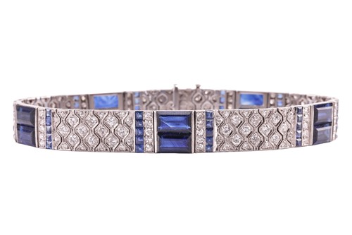 Lot 204 - An Art Deco sapphire and diamond line bracelet...