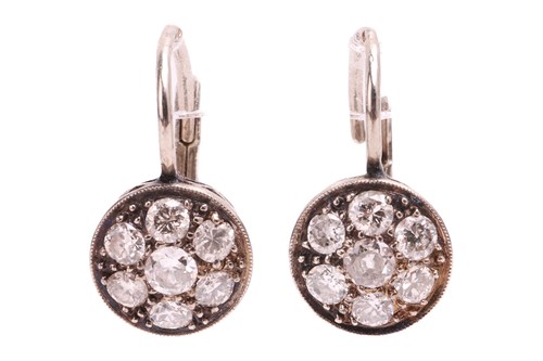Lot 64 - A pair of diamond cluster earrings, each set...