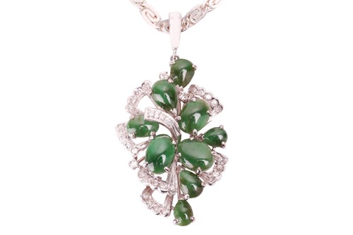 Lot 109 - A jadeite and diamond cluster pendant and...