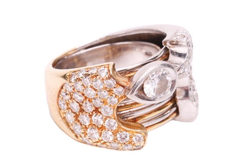 Lot 32 - A diamond dress ring in an abstract design,...