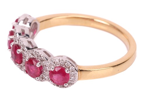 Lot 194 - A ruby and diamond cluster ring in 18ct gold,...
