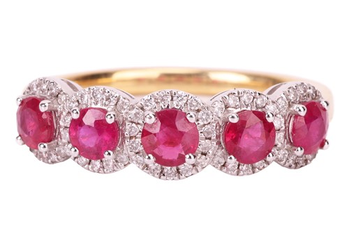 Lot 194 - A ruby and diamond cluster ring in 18ct gold,...