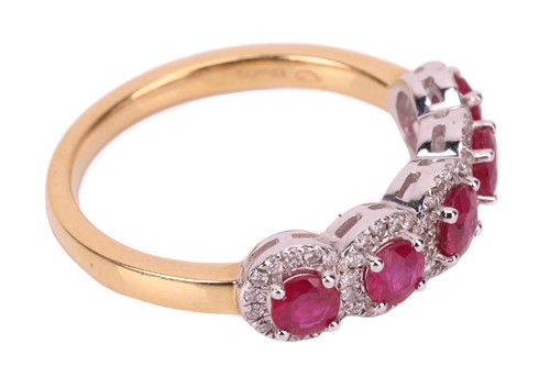 Lot 194 - A ruby and diamond cluster ring in 18ct gold,...