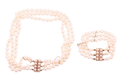 Lot 42 - A three-strand pearl choker necklace and...