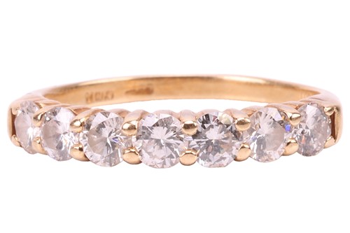 Lot 68 - A seven-stone diamond half-hoop ring in 18ct...