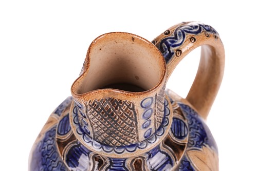 Lot 41 - A late 19th-century stoneware jug by Thomas...