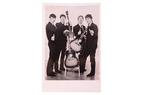 Lot 175 - The Beatles: an original black and white...