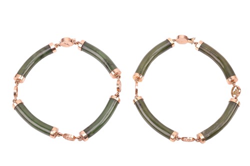 Lot 21 - Two Chinese nephrite bracelets, comprising...