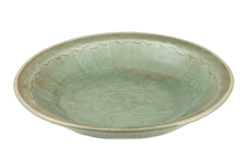 Lot 137 - A Chinese Longquan celadon circular charger,...