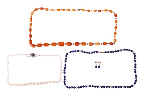 Lot 28 - Three beaded necklaces and a pair of matching...