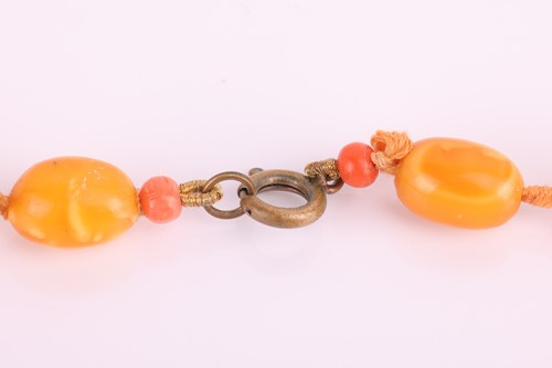 Lot 28 - Three beaded necklaces and a pair of matching...