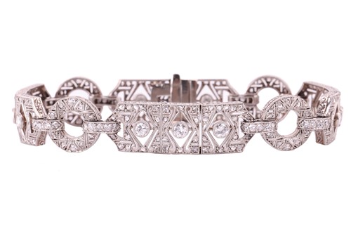 Lot 97 - An Art Deco diamond bracelet, set throughout...