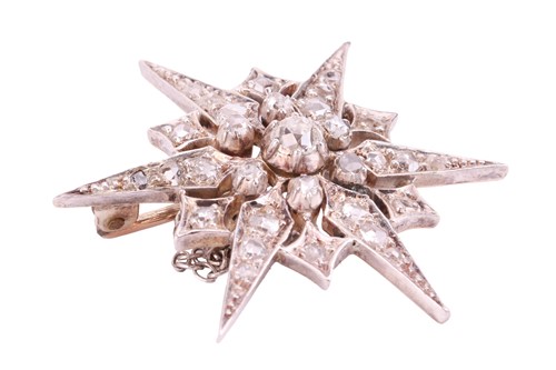 Lot 48 - A Victorian star brooch, set throughout with...