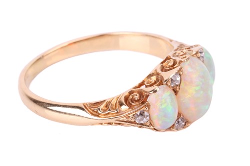 Lot 25 - An opal and diamond half-hoop ring, featuring...