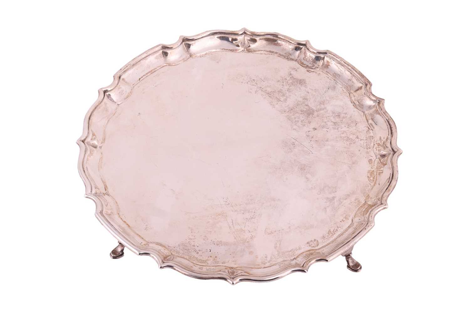 Lot 57 - An Edwardian silver salver by Barker Brothers...