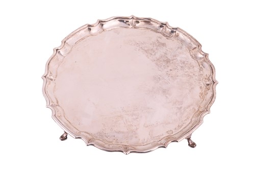 Lot 57 - An Edwardian silver salver by Barker Brothers...