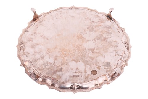 Lot 57 - An Edwardian silver salver by Barker Brothers...