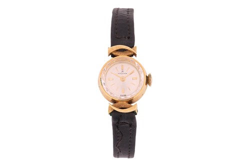 Lot 151 - An 18ct gold Hugeunin Lady's dress watch,...