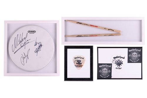 Lot 94 - Motörhead: a group of signed and framed items,...