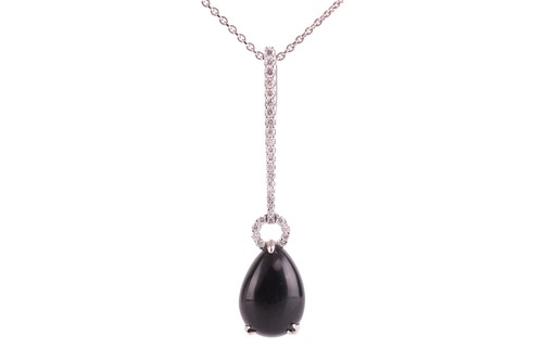 Lot 17 - A Whitby jet and diamond drop pendant on chain,...