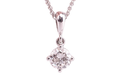 Lot 75 - A diamond solitaire pendant, featuring a round...