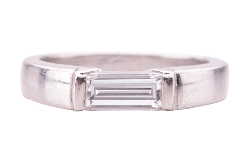 Lot 62 - A diamond solitaire platinum ring, featuring a...