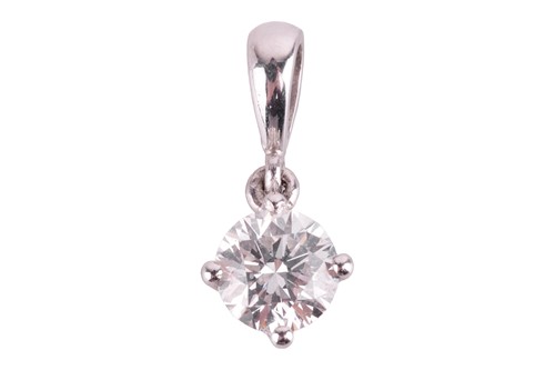Lot 79 - A diamond solitaire pendant, the round...
