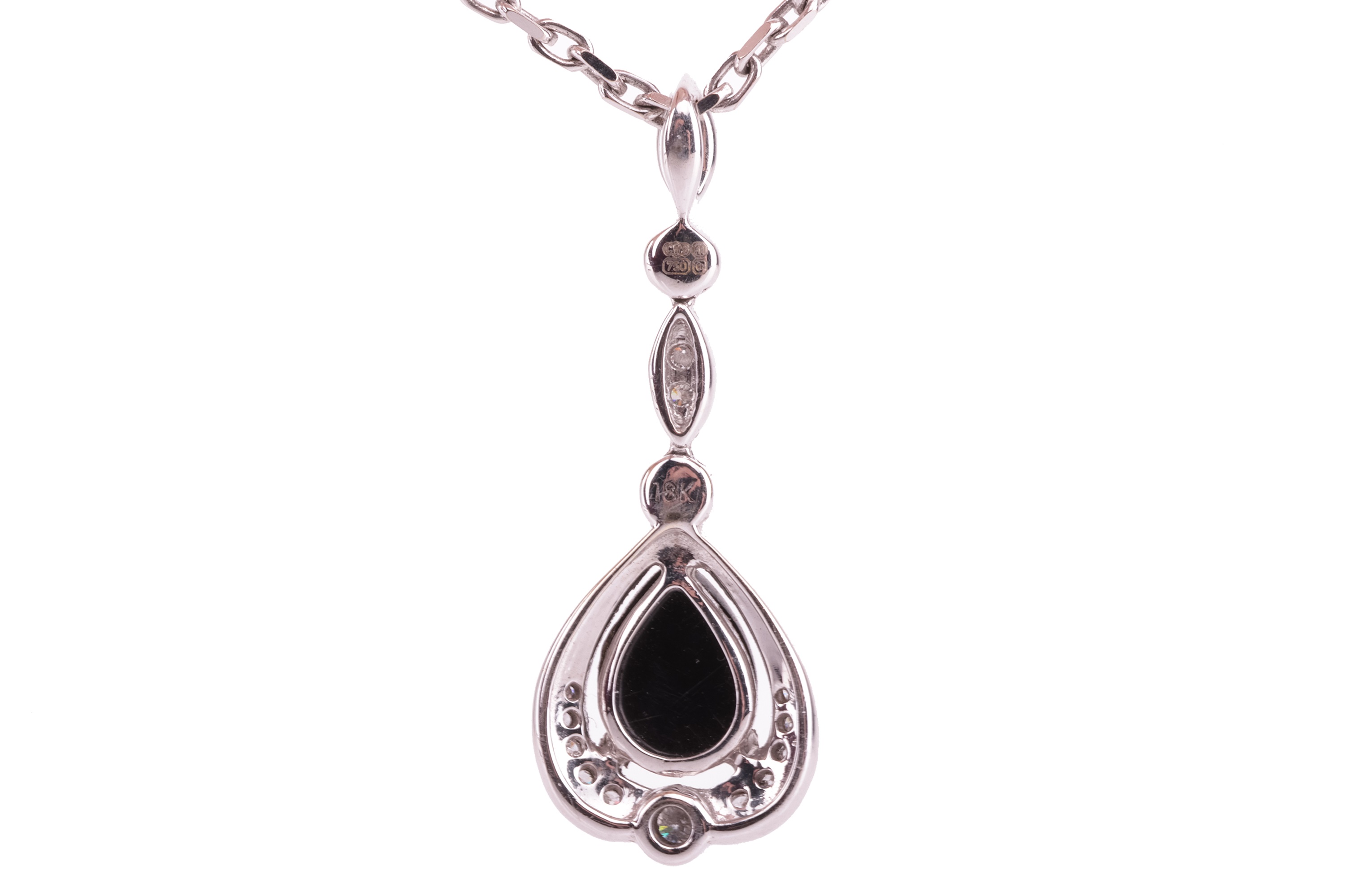 Lot 55 - A jet and diamond-set drop pendant, the