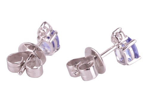 Lot 84 - A pair of tanzanite and diamond earrings, the...