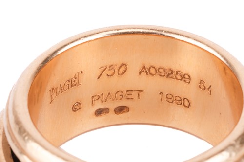 Lot 116 - An 18ct gold "Possession" ring, by Piaget. The...