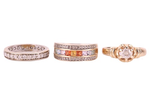Lot 94 - Three gem-set rings comprising a diamond-set...