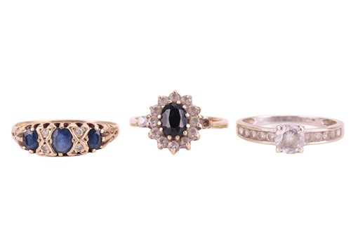 Lot 96 - Three gem-set rings comprising a sapphire and...