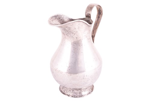 Lot 208 - A white metal jug possibly Bolivian of...