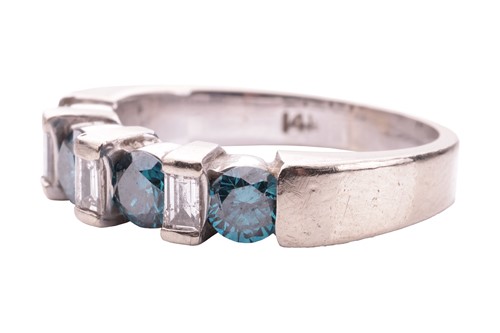Lot 125 - A seven-stone diamond half hoop ring, the...