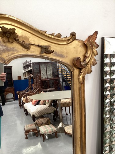 Lot 124 - A 19th century giltwood overmantel mirror, the...