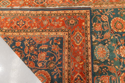 Lot 126 - A large Ushak Carpet, the red palmette and...
