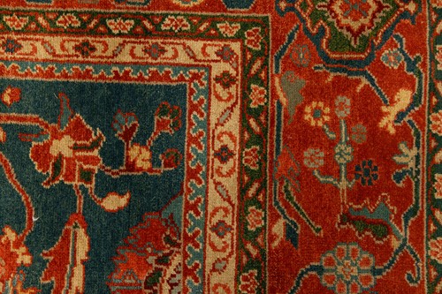 Lot 126 - A large Ushak Carpet, the red palmette and...