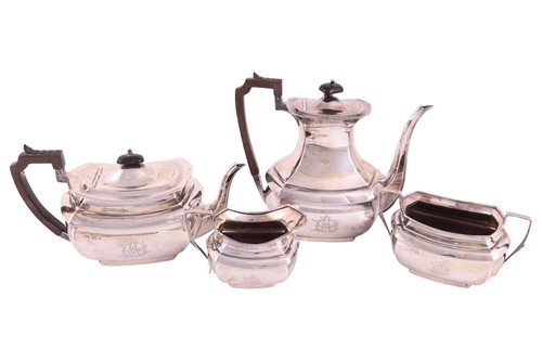 Lot 253 - A four piece tea service, curved rectangular,...