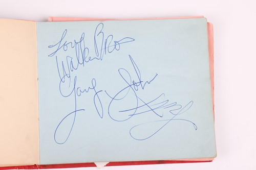 Lot 206 - The Beatles: a 1960s autograph book containing...