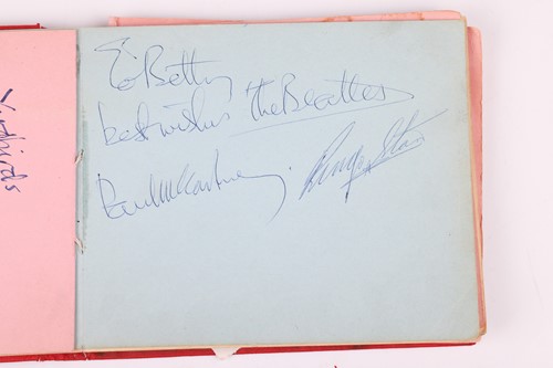 Lot A 1960s autograph book containing many...