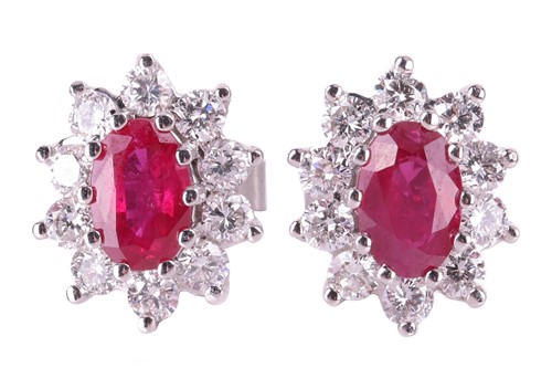 Lot A pair of ruby and diamond cluster earrings,...