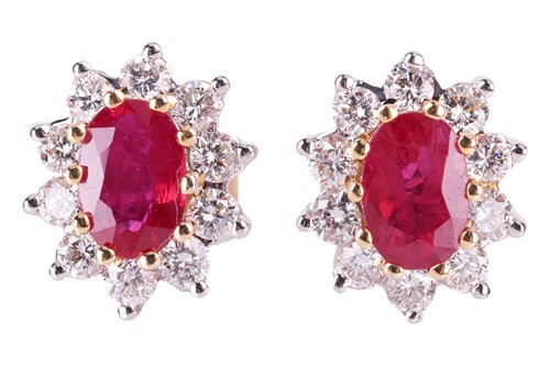 Lot 60 - A pair of ruby and diamond cluster earrings,...