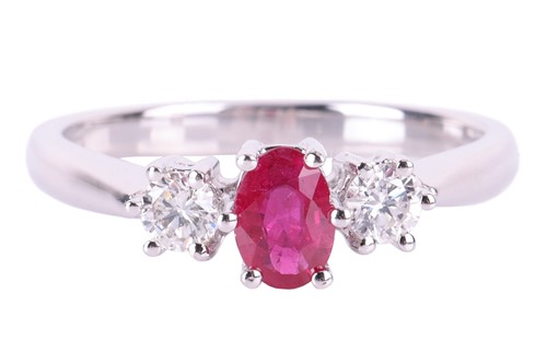 Lot 131 - A ruby and diamond three-stone ring, claw-set...