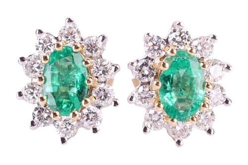 Lot A pair of emerald and diamond cluster earrings,...