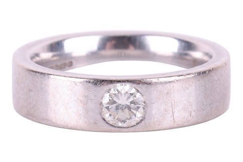 Lot 91 - A diamond-set wedding band in 18ct white gold,...