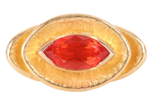 Lot 48 - A Modernist cocktail ring set with fire opal,...