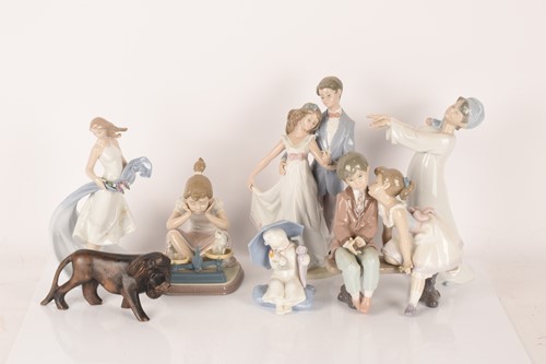 Lot 90 - Lladro: A collection of figurines comprising...
