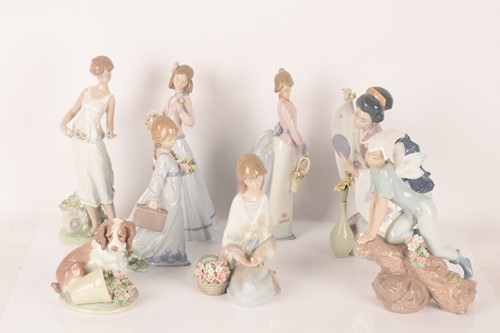 Lot 86 - Lladro: A collection of figurines comprising a...