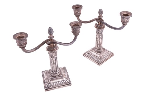 Lot 257 - A pair of Norwegian two light candelabra, of...