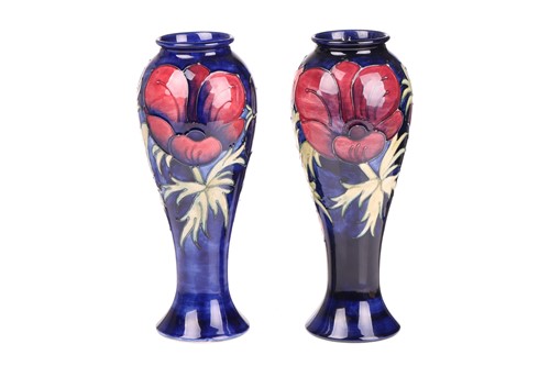 Lot 59 - A near pair of Walter Moorcroft tall vases, in...